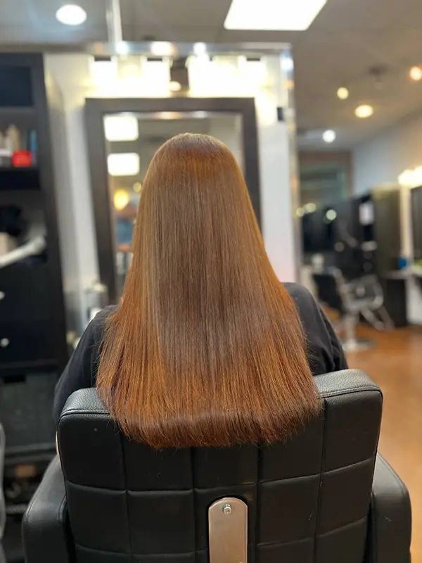 Soft, glossy, healthy-looking hair after a professional biotin hair treatment at CocoRez in Port Coquitlam.