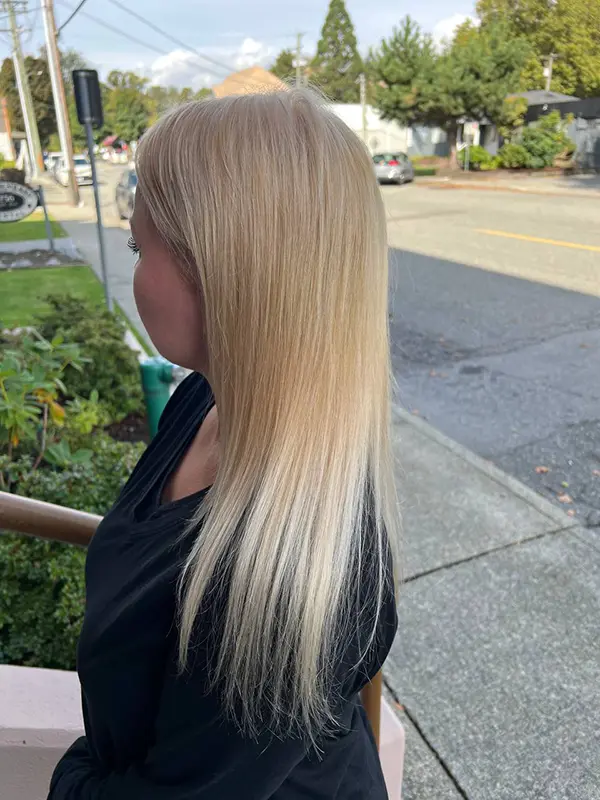 Platinum blonde hair after professional bleaching with a smooth, even finish by CocoRez in Port Coquitlam.