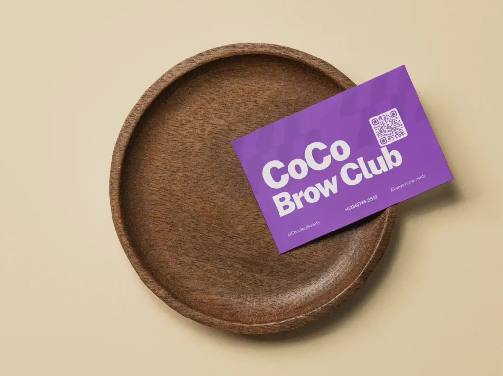 Brow membership port coquitlam - Coco Brow Club card on a wooden tray