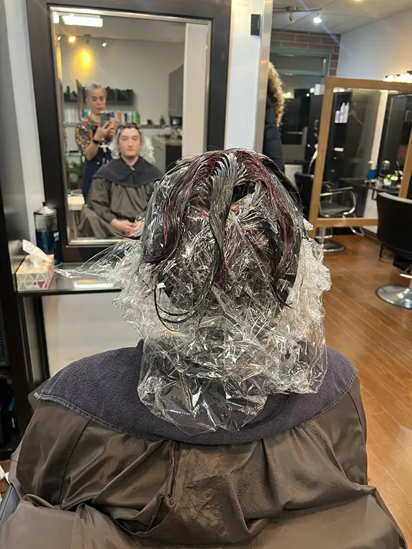 Full hair color application in progress during a professional color service at CocoRez in Port Coquitlam.
