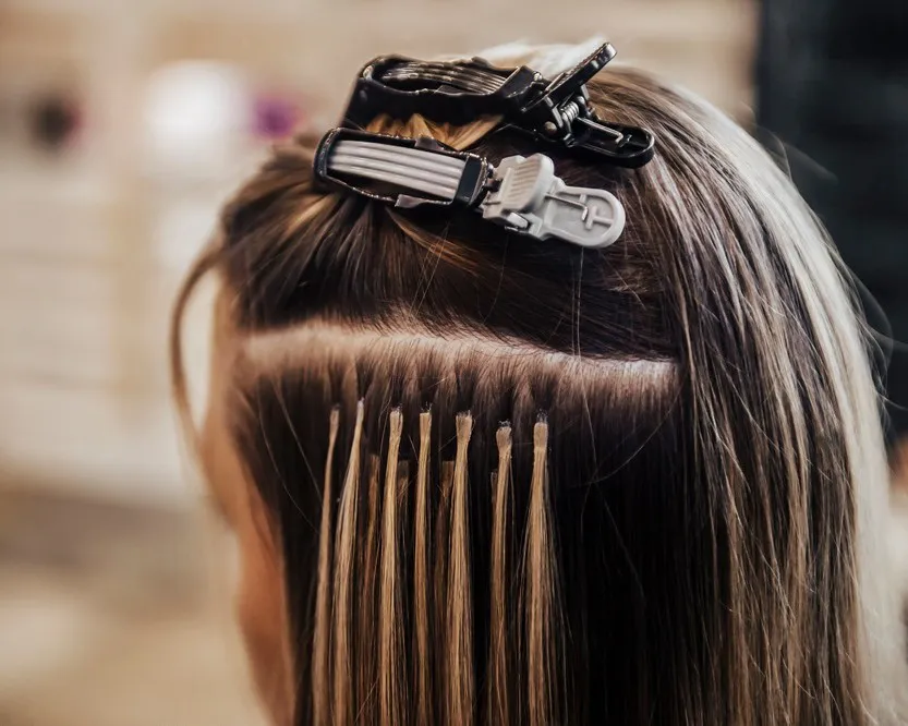 Hair extensions and tinsel Port Coquitlam clients love, installed at CocoRez.