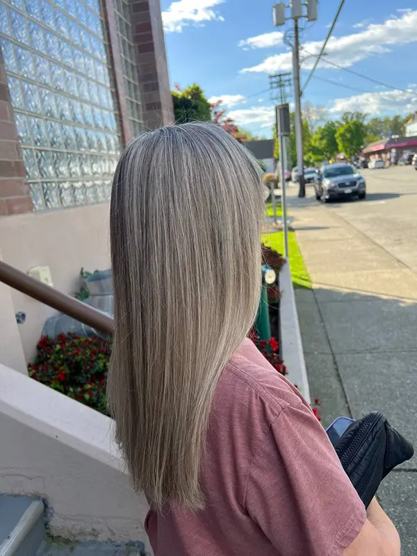 Icy blonde hair refined with a professional silver toner for a cool, even finish by CocoRez in Port Coquitlam.