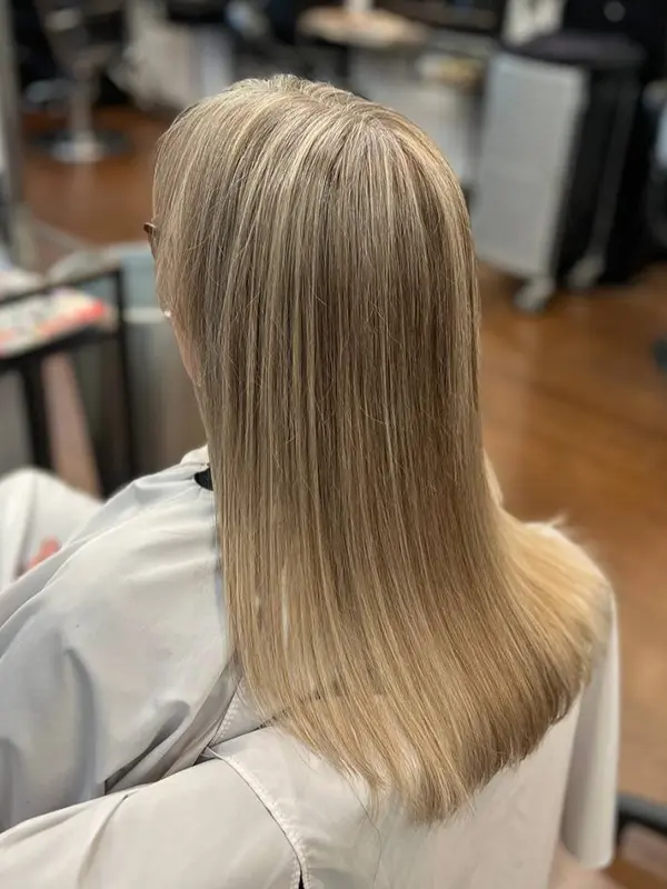 After a highlights service with cool blonde dimension by CocoRez in Port Coquitlam.