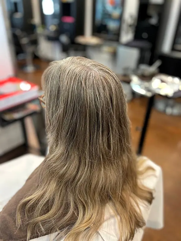 Before a highlights service showing natural blonde hair at CocoRez in Port Coquitlam.