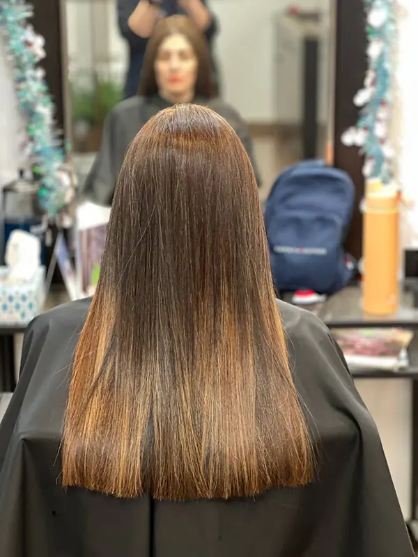 After keratin treatment with long, smooth, shiny, frizz-free hair at CocoRez in Port Coquitlam.