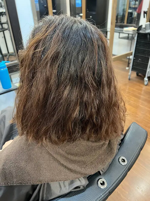 Before keratin treatment showing frizzy, dry hair before smoothing service at CocoRez in Port Coquitlam.
