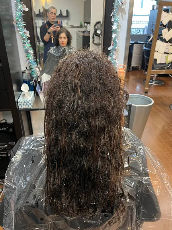 Before keratin treatment showing long frizzy, dry hair before smoothing service at CocoRez in Port Coquitlam.
