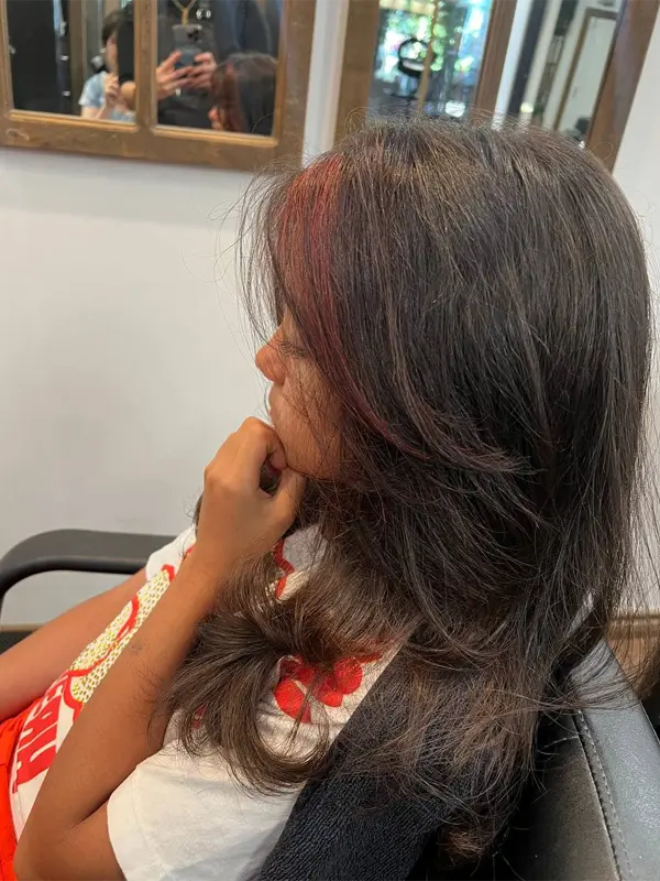 Kids layered haircut with soft movement and face-framing layers by CocoRez in Port Coquitlam.
