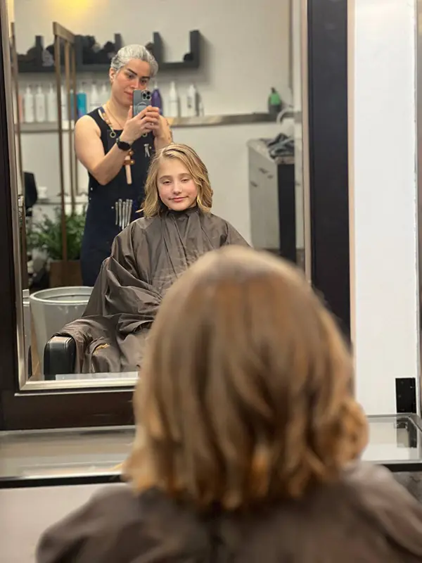 Kids medium layered haircut with soft natural waves by CocoRez in Port Coquitlam.