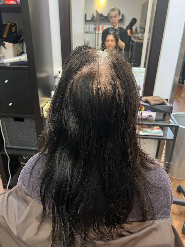 Before a root touch-up service showing visible gray hair regrowth at CocoRez in Port Coquitlam.