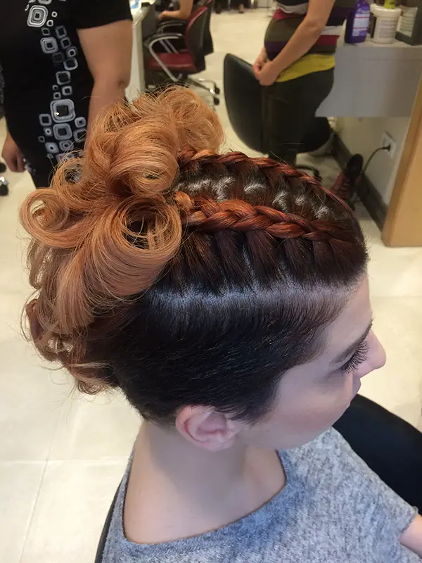 Elegant braided updo with sculpted curls for a special occasion by CocoRez in Port Coquitlam.