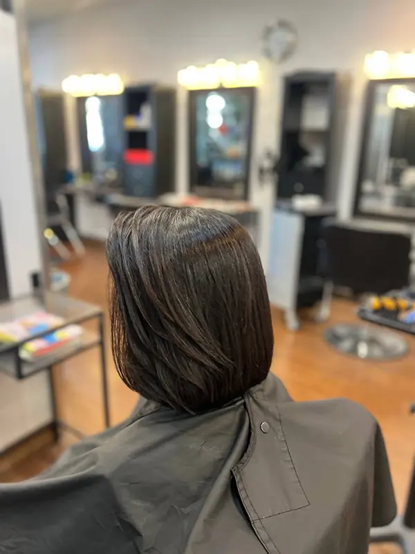 Women's classic bob haircut with a smooth finish by CocoRez in Port Coquitlam.