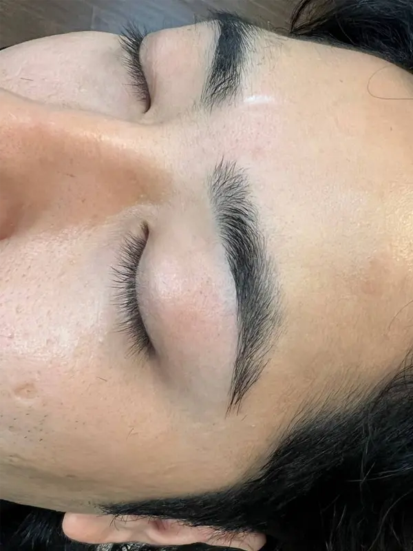 After eyebrow shaping showing clean, defined, natural-looking brows at CocoRez in Port Coquitlam.