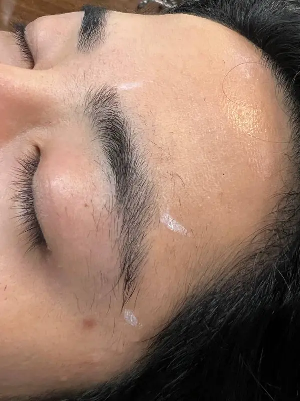 Before eyebrow shaping showing natural brows before professional brow design at CocoRez in Port Coquitlam.