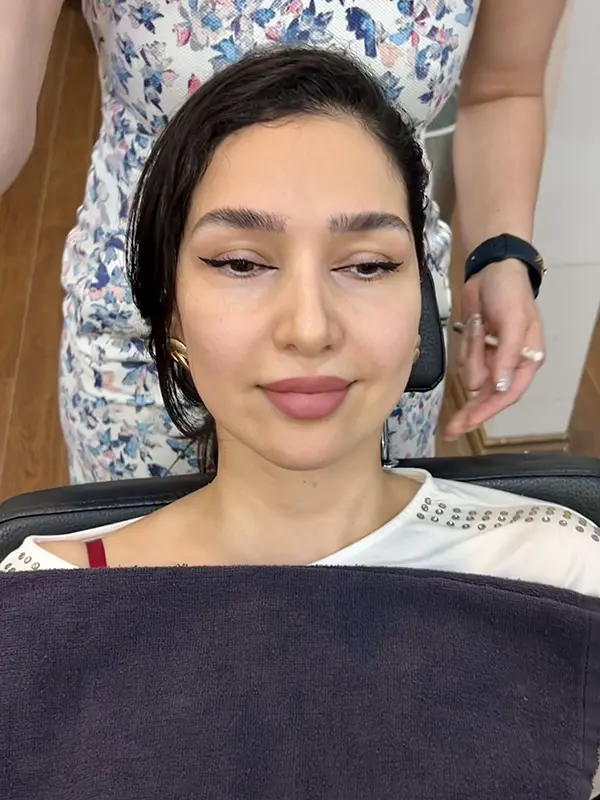 Client after a professional eyebrow tinting service with naturally defined brows at CocoRez in Port Coquitlam.