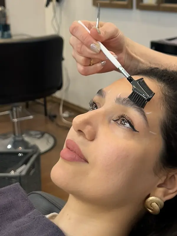 Professional eyebrow tint being applied during an eyebrow tinting service at CocoRez in Port Coquitlam.