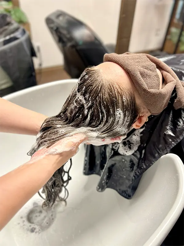 Professional head spa hair cleansing and scalp care treatment at CocoRez in Port Coquitlam.